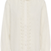 Crèmekleurige Saint Tropez blouse met broderie anglaise, lange mouwen en ruffle-detail aan de knoopsluiting.