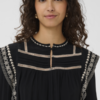 Zwarte Saint Tropez blouse met borduursel en sierlijke biezen