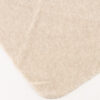 Kaia Creme 2 Teatro Kaia gebreide driehoeksjaal van een zachte cashmere blend.